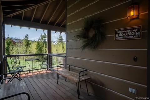 a view of balcony with wooden floor