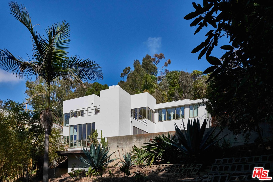 469 Upper Mesa Road Santa Monica, CA 90402 - Photo 1 of 33 a view of house with outdoor space and swimming pool