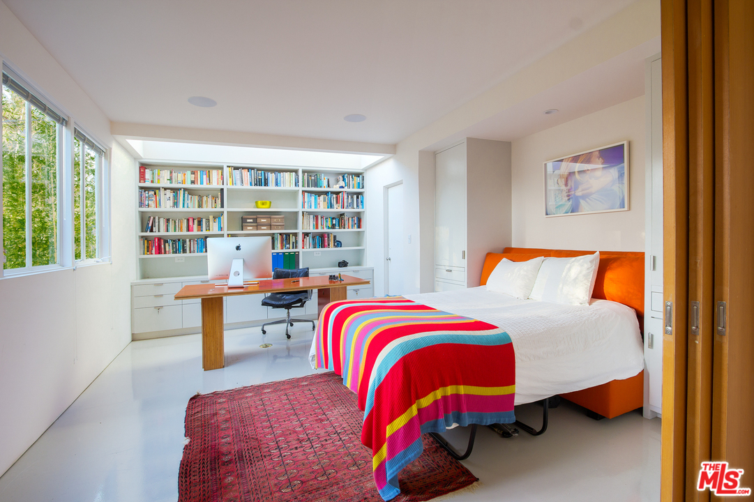 469 Upper Mesa Road Santa Monica, CA 90402 - Photo 11 of 33 a bedroom with a bed and window