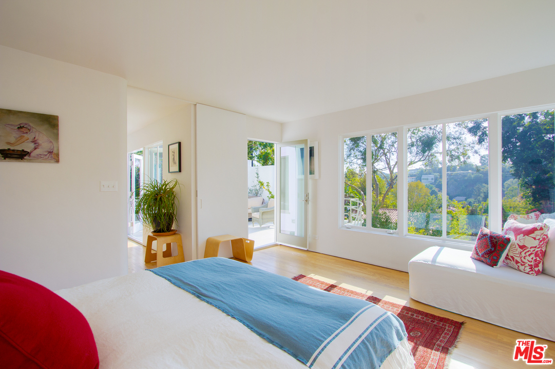 469 Upper Mesa Road Santa Monica, CA 90402 - Photo 21 of 33 a room with furniture and a large window