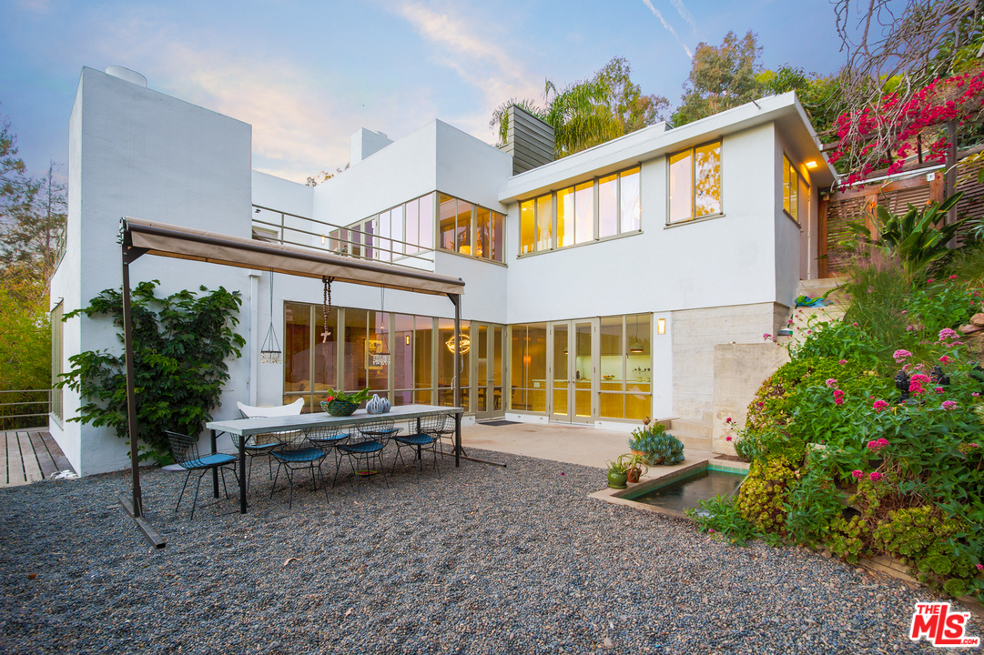 469 Upper Mesa Road Santa Monica, CA 90402 - Photo 29 of 33 a view of a house with backyard and sitting area