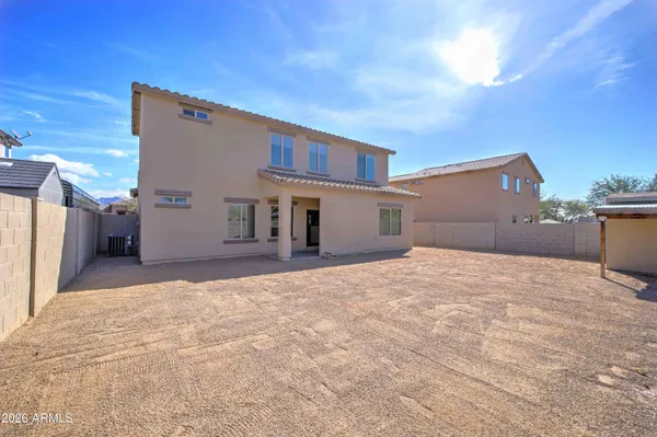 a view of a house with a snow in the yard