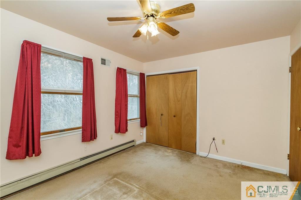 434 Burke Road Jackson, NJ 08527 - Photo 16 of 27 a view of a room with window and a ceiling fan