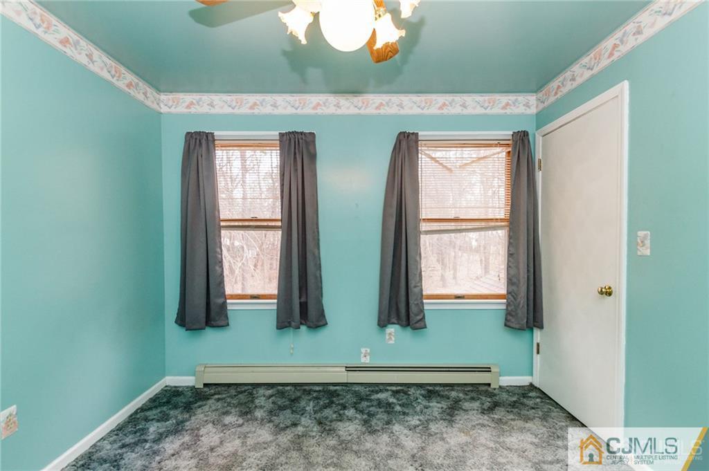 434 Burke Road Jackson, NJ 08527 - Photo 17 of 27 a view of two room with two windows