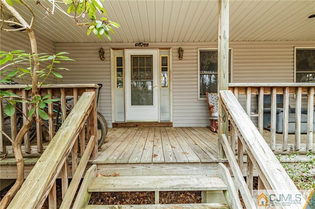 434 Burke Road Jackson, NJ 08527 - Photo 2 of 27 a view of outdoor space with deck