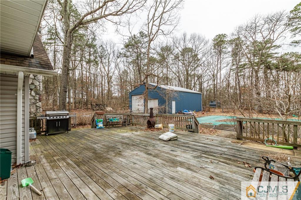 434 Burke Road Jackson, NJ 08527 - Photo 23 of 27 a view of a house with a yard and sitting area