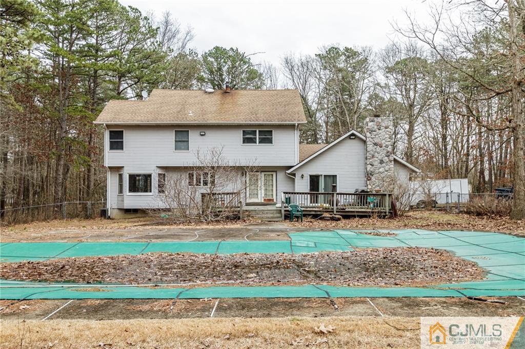 434 Burke Road Jackson, NJ 08527 - Photo 24 of 27 a front view of a house with garden