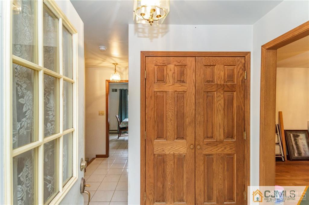 434 Burke Road Jackson, NJ 08527 - Photo 4 of 27 a view of a hallway with wooden floor and entryway