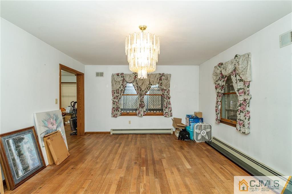 434 Burke Road Jackson, NJ 08527 - Photo 6 of 27 a view of livingroom with furniture and window