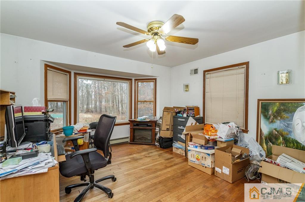 434 Burke Road Jackson, NJ 08527 - Photo 7 of 27 a living room with furniture and a flat screen tv