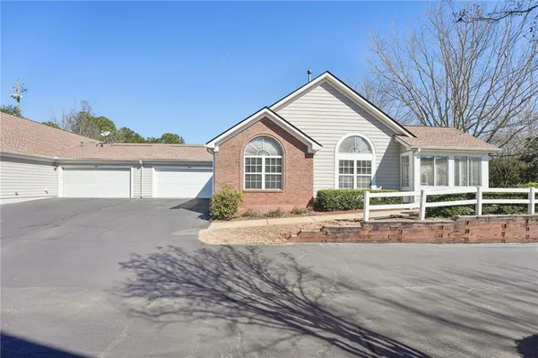 a view of a house and a yard