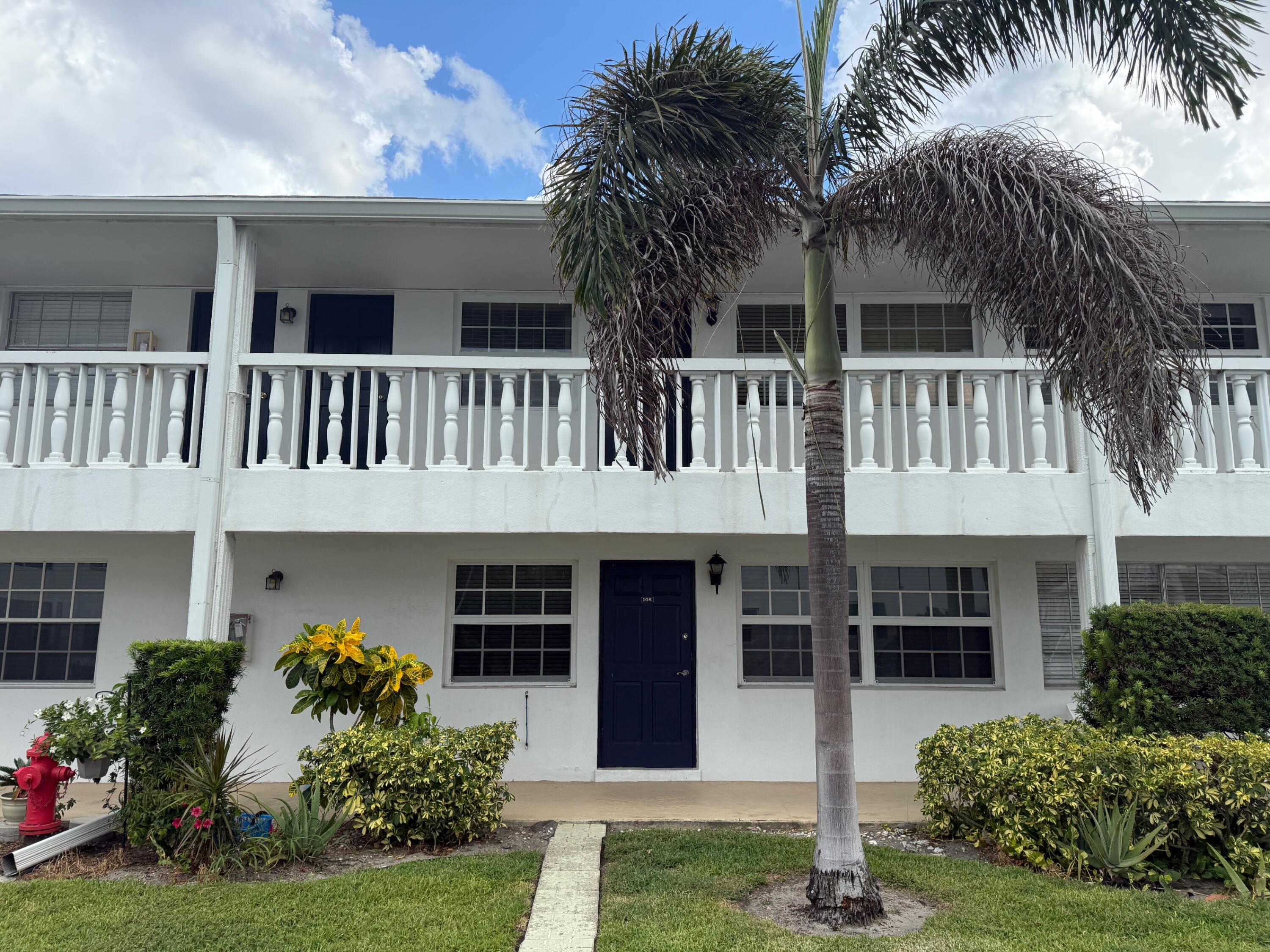 5505 North Ocean Boulevard, Unit 8108 Ocean Ridge, FL 33435 - Photo 22 of 22 front view of a house with a yard