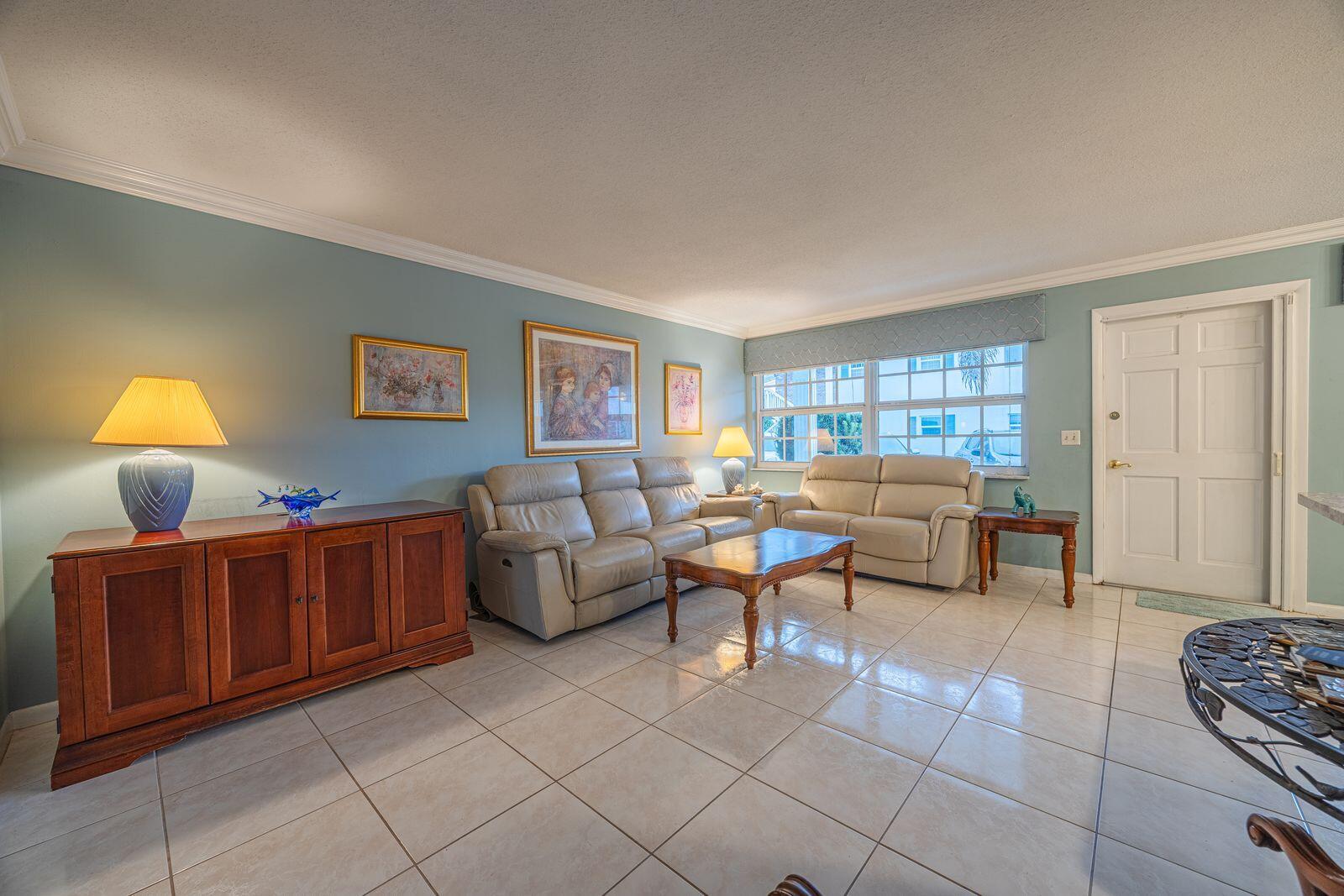 5505 North Ocean Boulevard, Unit 8108 Ocean Ridge, FL 33435 - Photo 6 of 22 a living room with furniture and a window