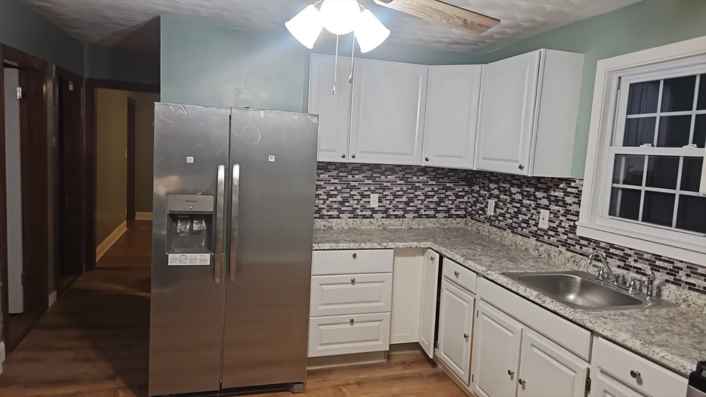 52 Fuller Street, Unit 1 Everett, MA 02149 - Photo 8 of 10 a kitchen with a sink and cabinets