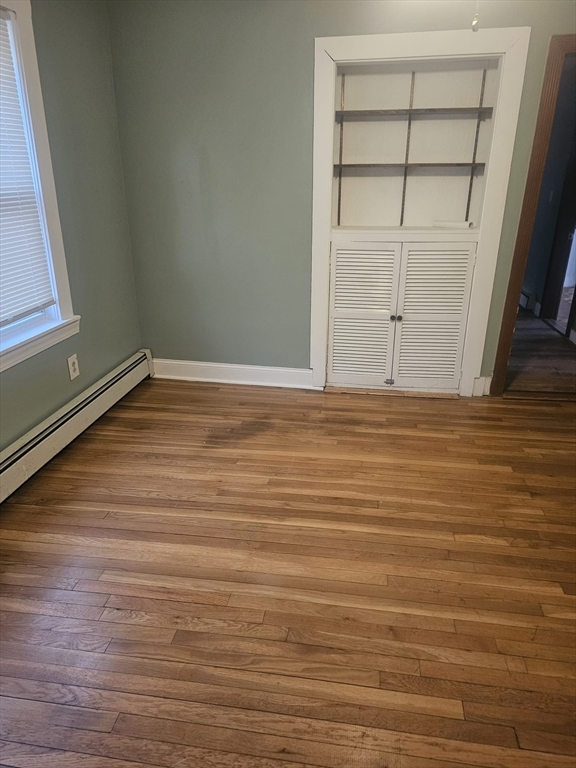 52 Fuller Street, Unit 1 Everett, MA 02149 - Photo 9 of 10 a view of room with hardwood floor