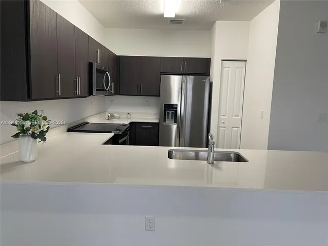 $2,600 | 15520 Southwest 136th Street, Unit 103, Miami, FL 33196
