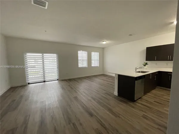 a room with furniture and window