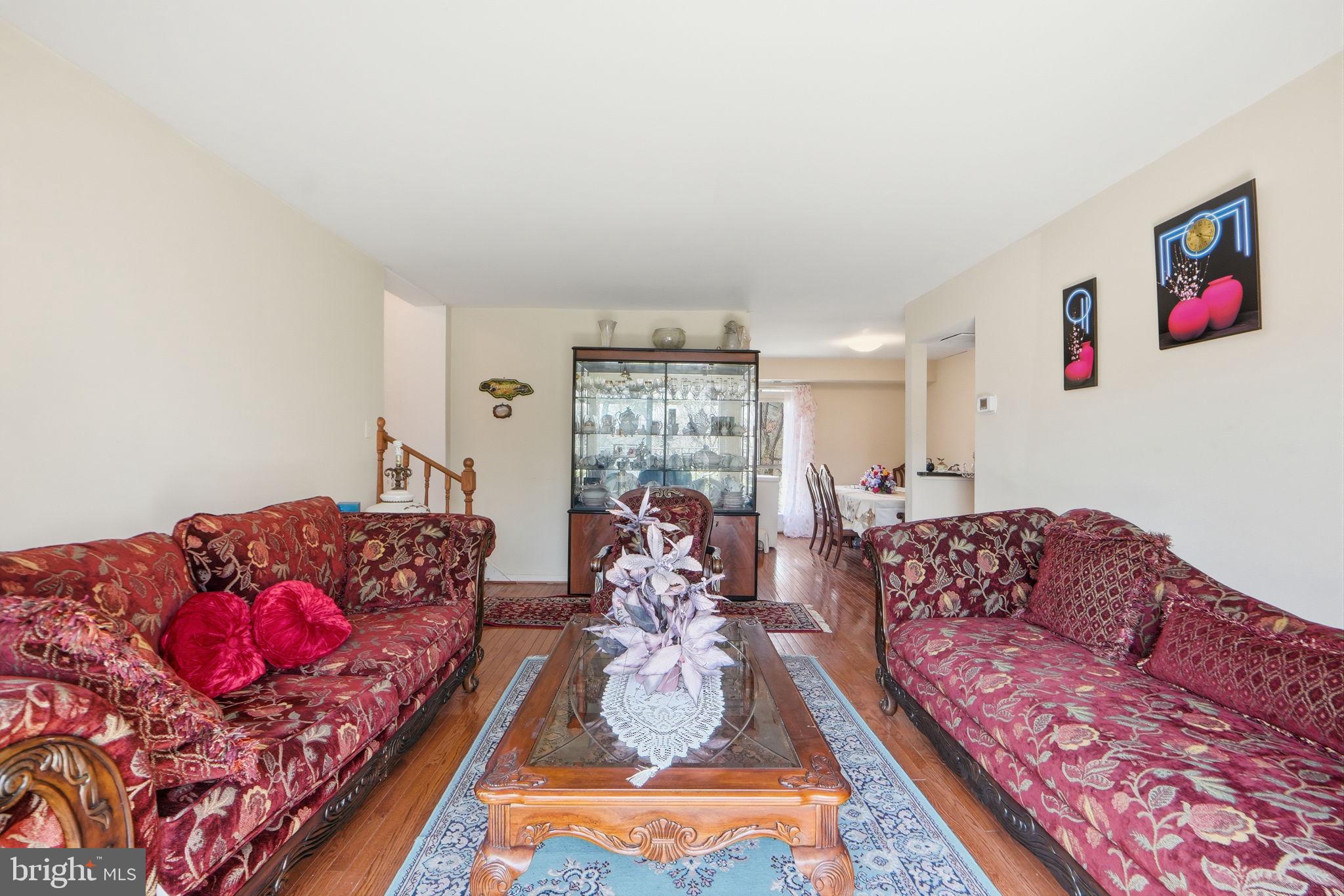 17805 Buehler Road, Unit 3 Olney, MD 20832 - Photo 11 of 30 a living room with furniture or couch and a large window