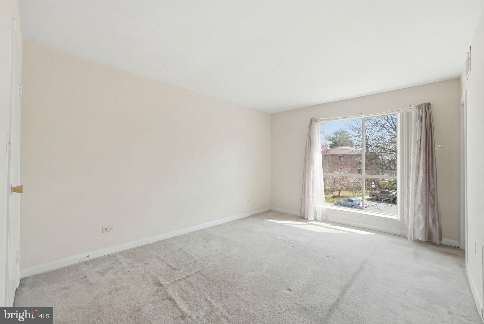 17805 Buehler Road, Unit 3 Olney, MD 20832 - Photo 20 of 30 an empty room with windows
