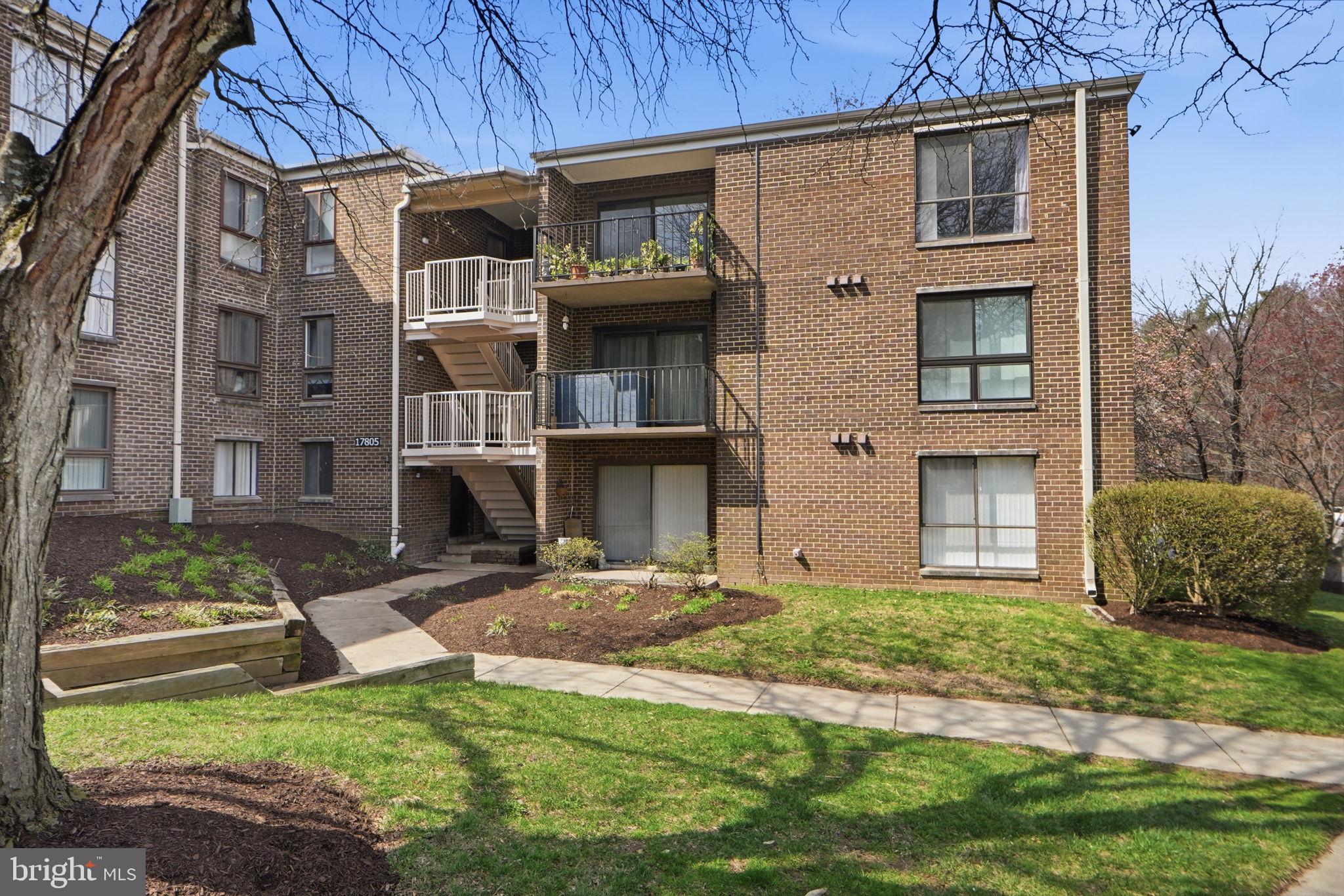 17805 Buehler Road, Unit 3 Olney, MD 20832 - Photo 26 of 30 a view of a brick house with a yard