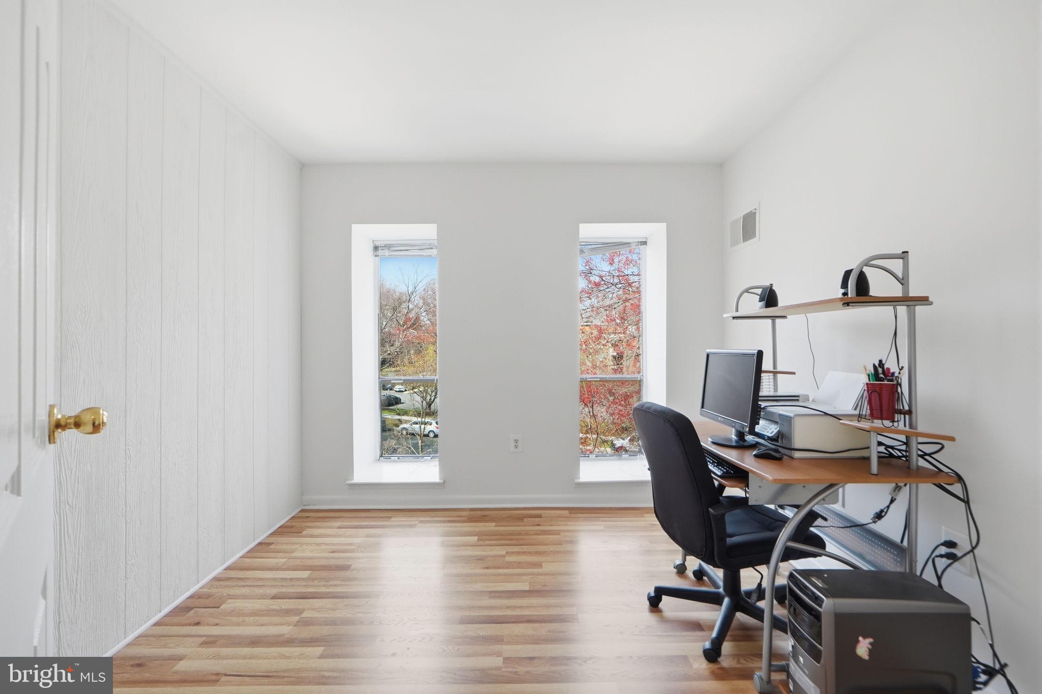 17805 Buehler Road, Unit 3 Olney, MD 20832 - Photo 4 of 30 a view of a workspace with furniture and a window