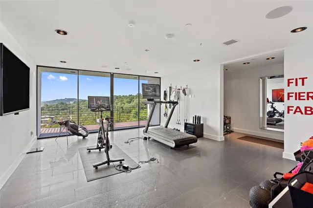 a view of a room with gym equipment