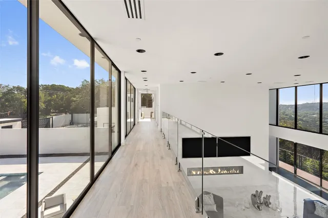 a view of a living room with a large window