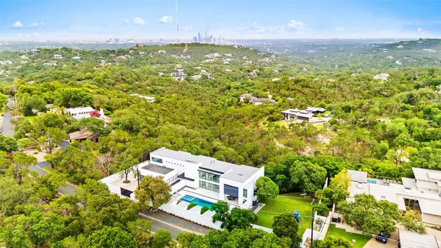 view of a city with lots of bushes