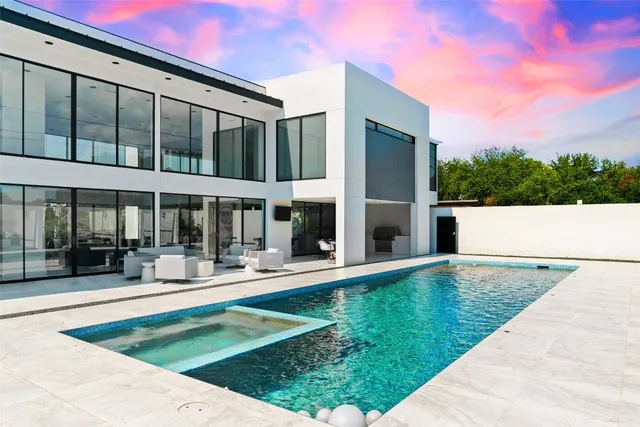 a swimming pool with outdoor view