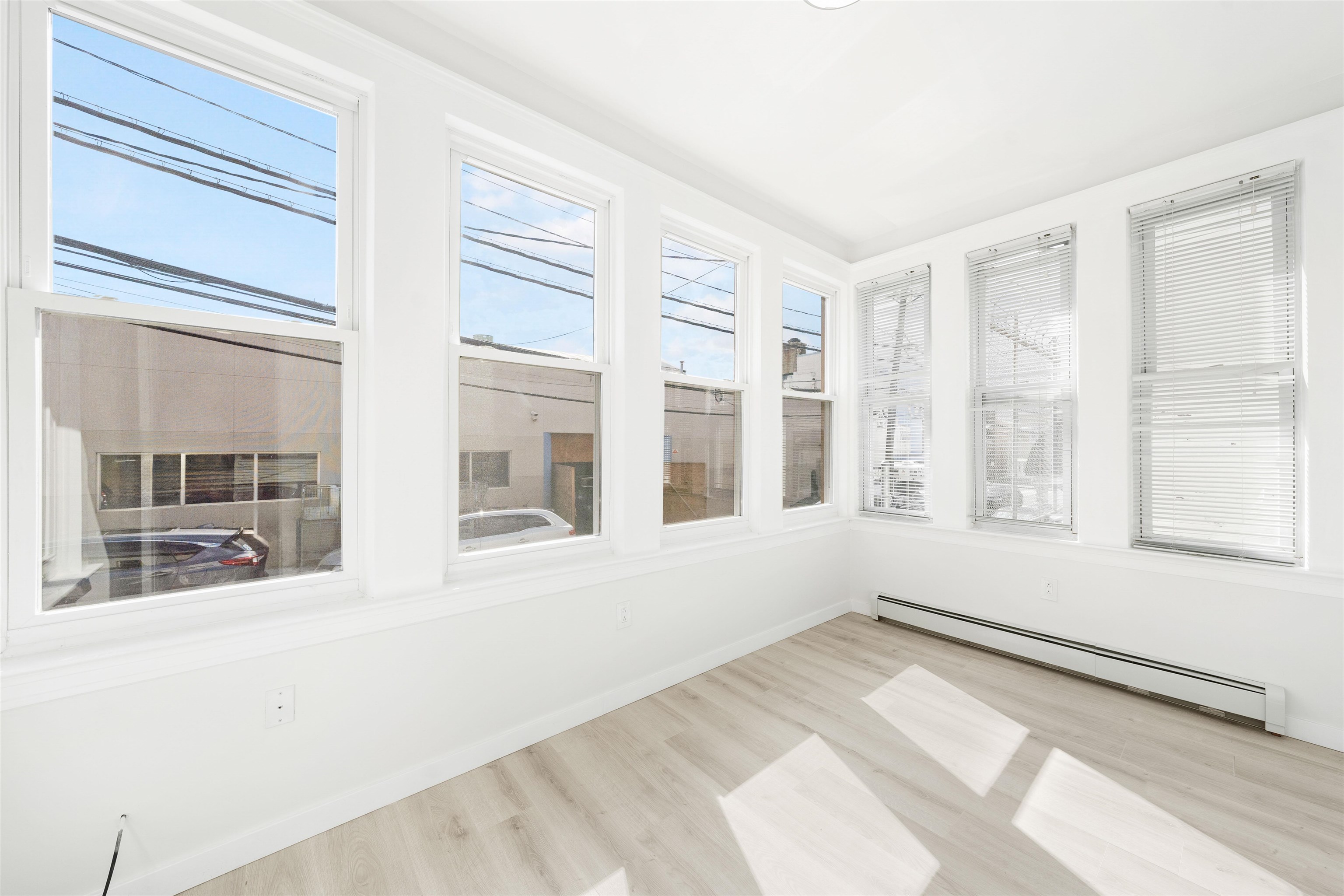 600 67th Street, Unit 1 & LL West New York, NJ 07093 - Photo 14 of 29 a view of an empty room with a window