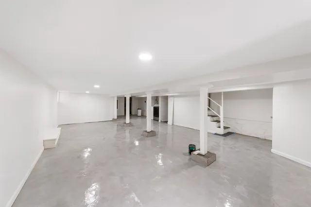 a front view of a house with sitting area