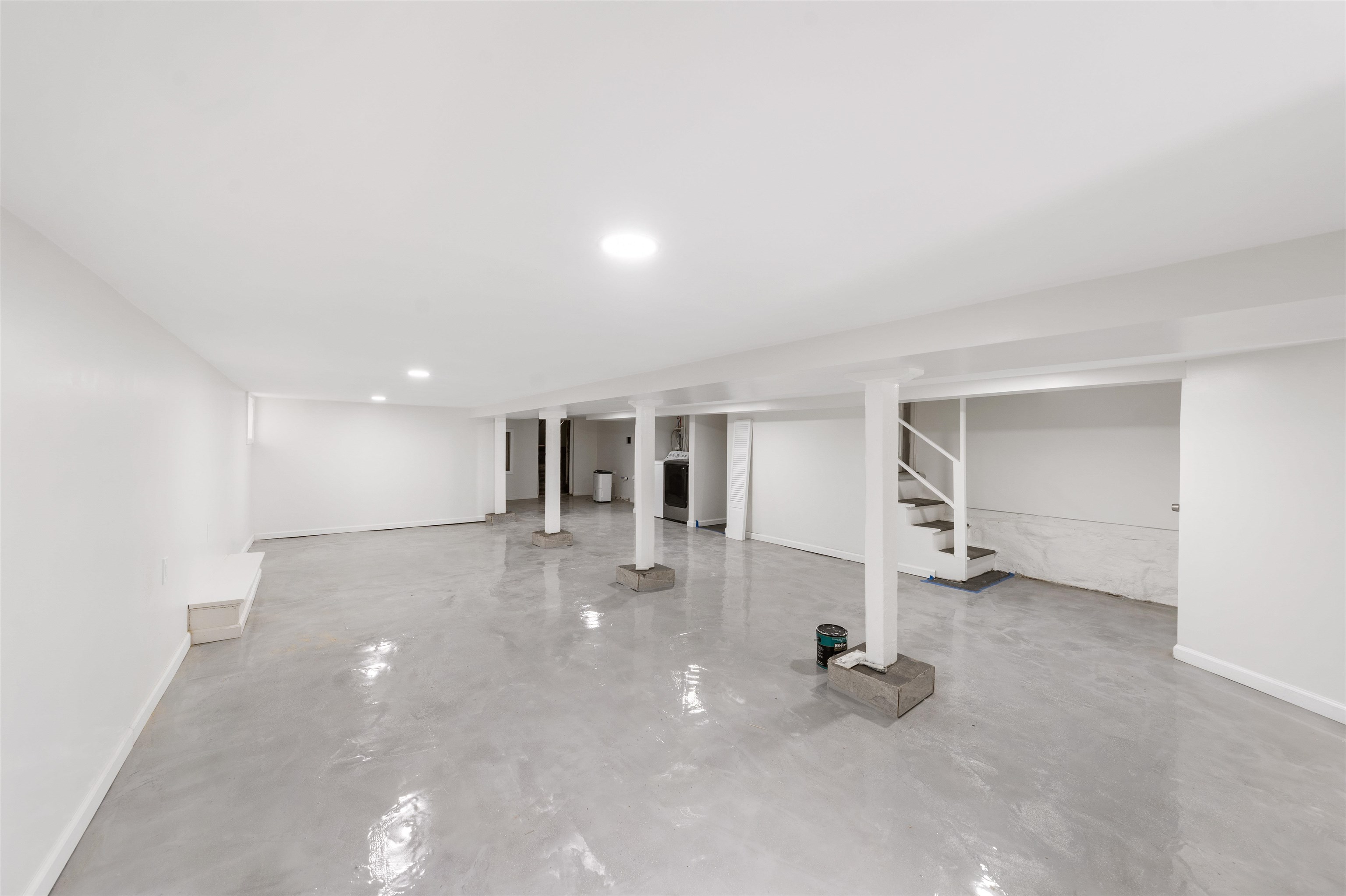 600 67th Street, Unit 1 & LL West New York, NJ 07093 - Photo 17 of 29 an empty room with windows and pillars in it