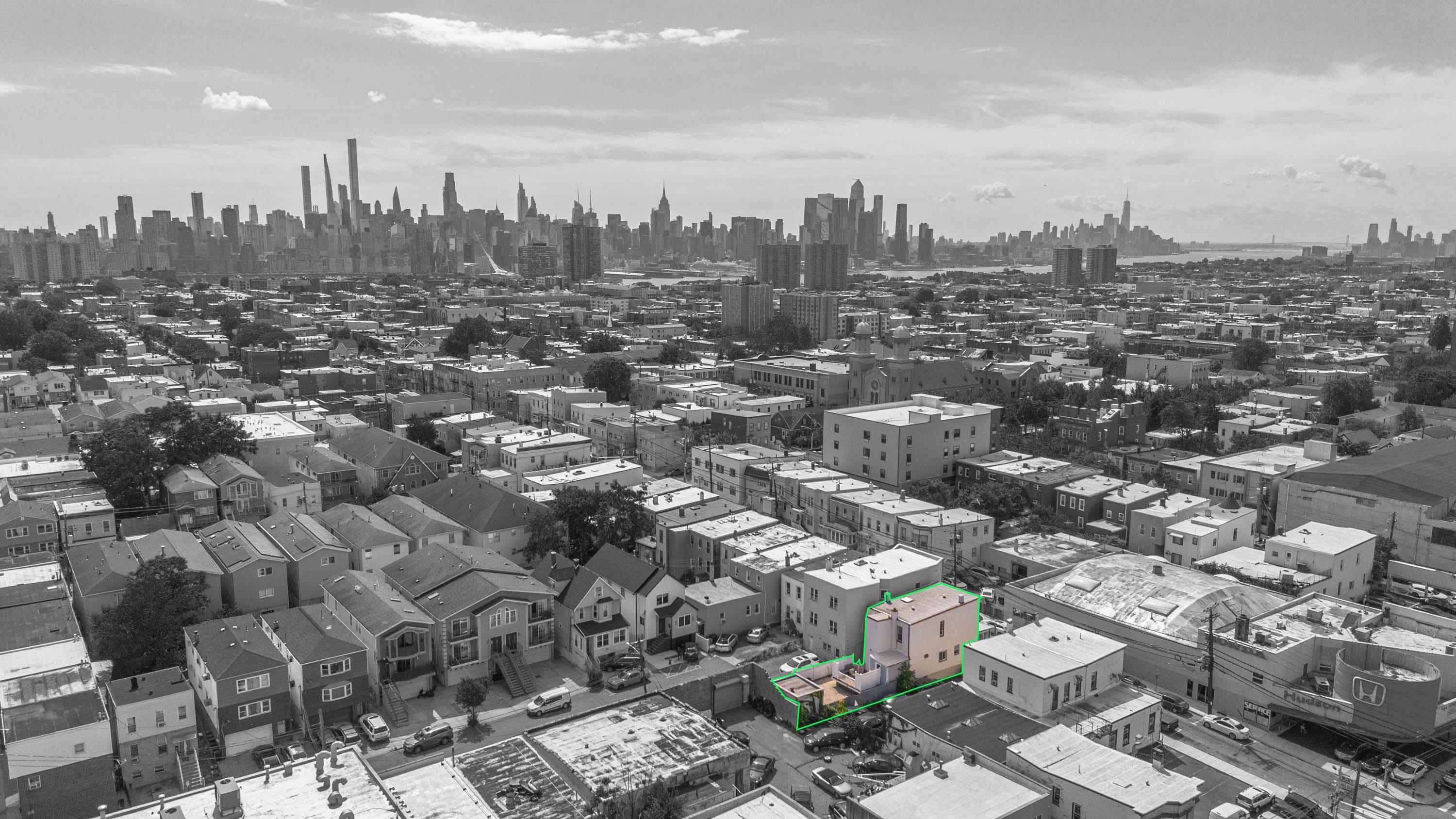 600 67th Street, Unit 1 & LL West New York, NJ 07093 - Photo 26 of 29 an aerial view of a city with lots of residential buildings