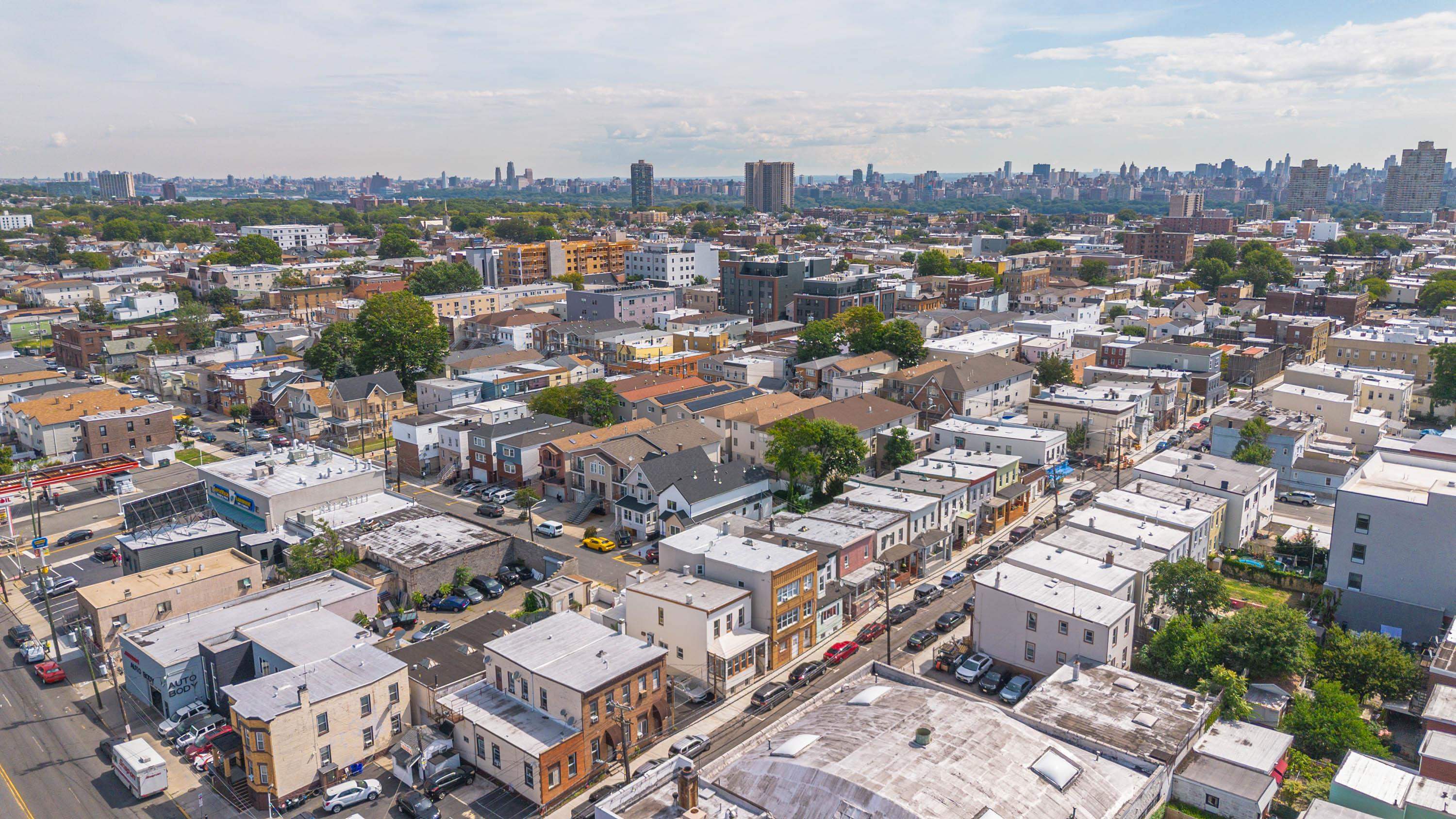 600 67th Street, Unit 1 & LL West New York, NJ 07093 - Photo 27 of 29 an aerial view of a city with lots of residential buildings