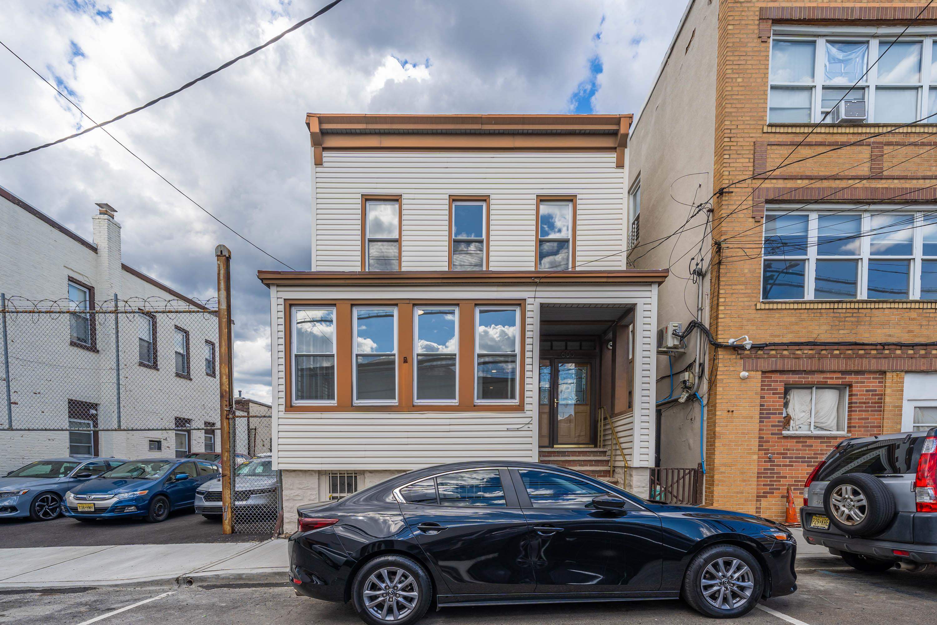600 67th Street, Unit 1 & LL West New York, NJ 07093 - Photo 29 of 29 a car parked in front of a building