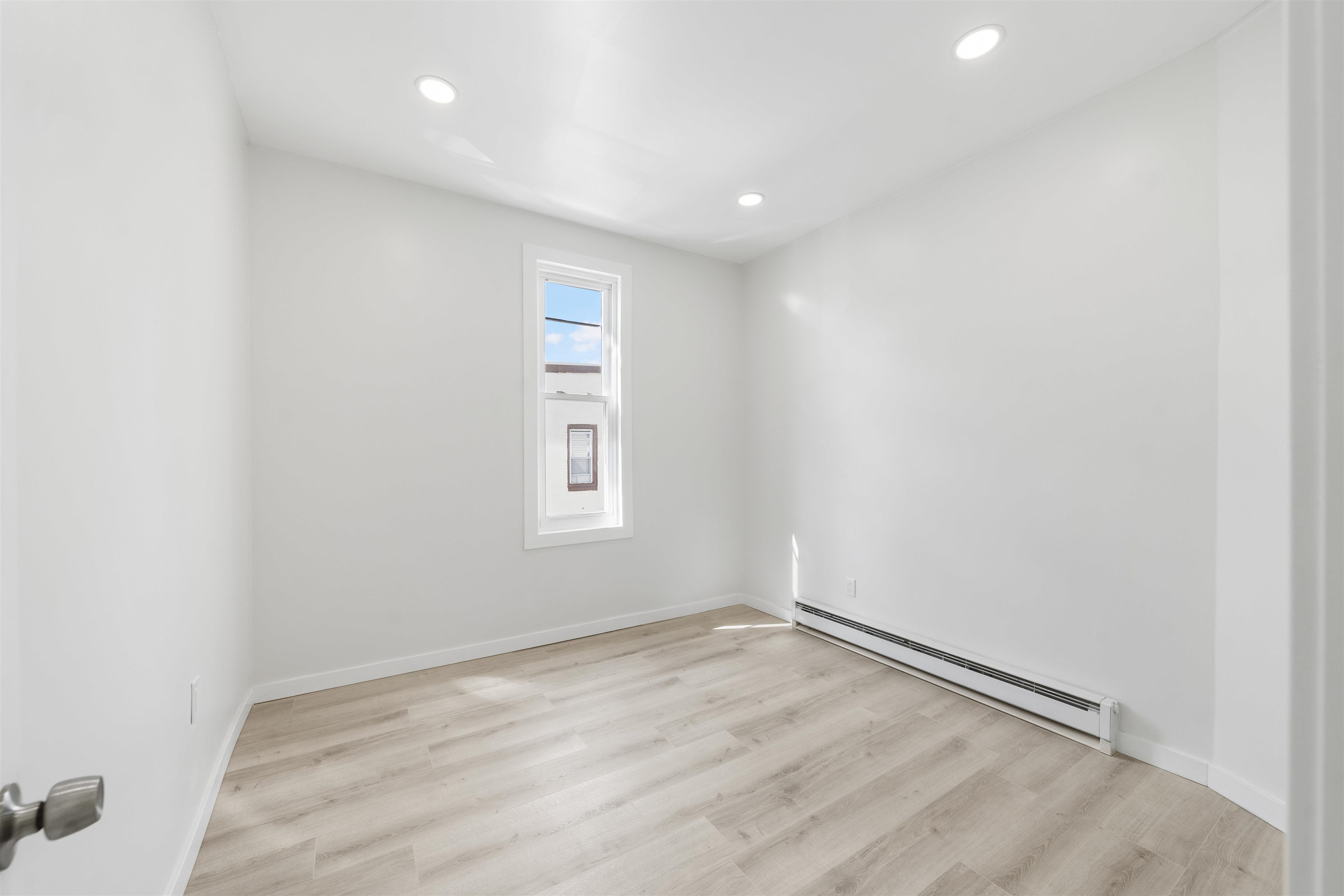 600 67th Street, Unit 1 & LL West New York, NJ 07093 - Photo 10 of 29 an empty room with a workbench