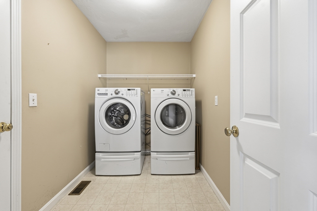 9 Rock Marsh Road, Unit B Wareham, MA 02571 - Photo 28 of 41 a utility room with dryer and washer