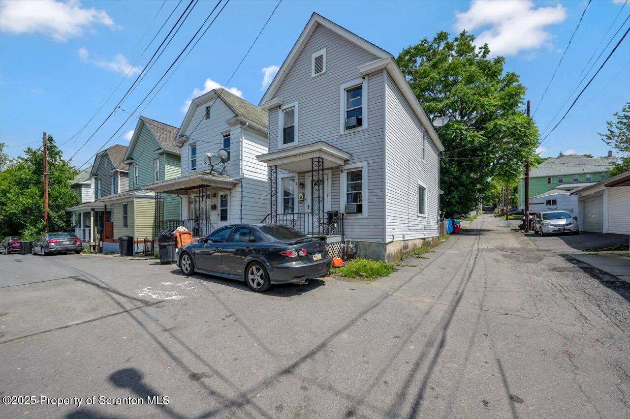 a car parked in front of a house