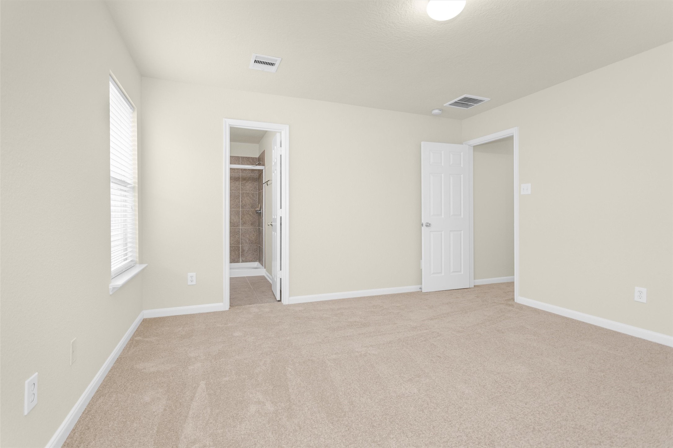 3131 Beacon Grove Street Spring, TX 77389 - Photo 19 of 38 a view of an empty room with a window