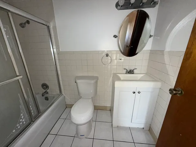 a bathroom with a toilet and a sink