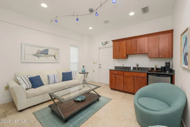 a bedroom with a large bed and a large window