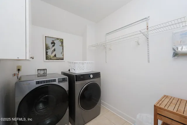 a view of stairs and yard in front of house