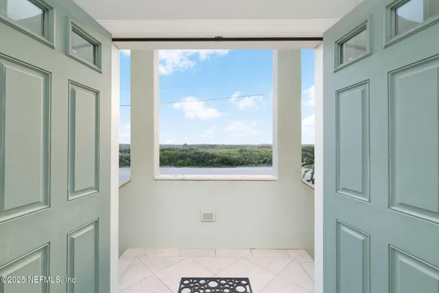 a large kitchen with stainless steel appliances granite countertop a refrigerator and a stove top oven