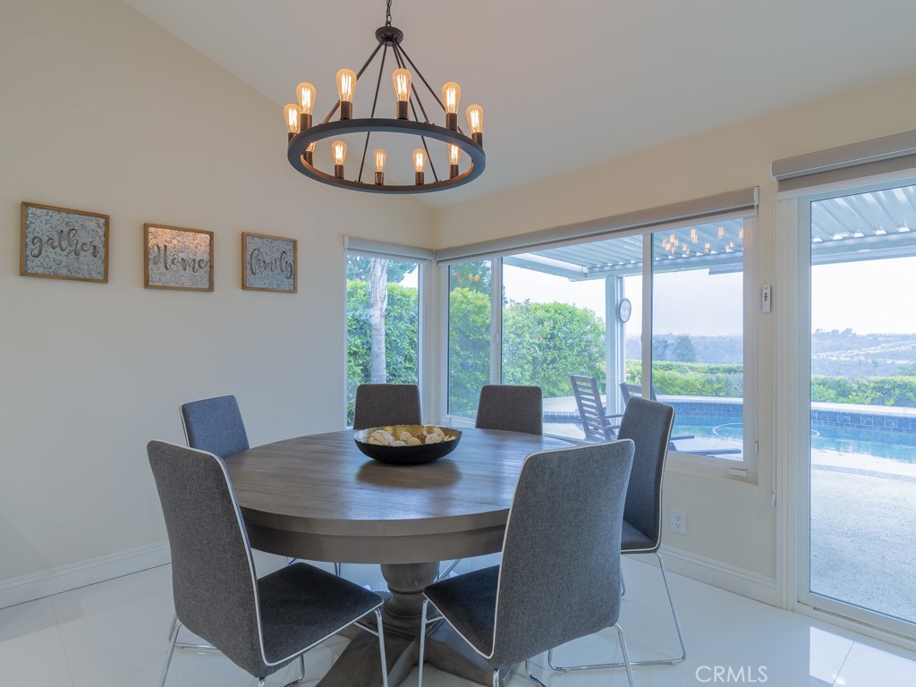 3305 Hawkwood Road Diamond Bar, CA 91765 - Photo 13 of 32 a view of a dining room with furniture wooden floor and chandelier