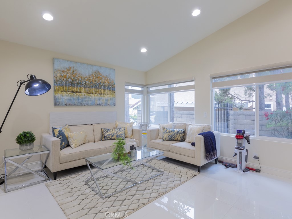 3305 Hawkwood Road Diamond Bar, CA 91765 - Photo 15 of 32 a living room with furniture and a large window