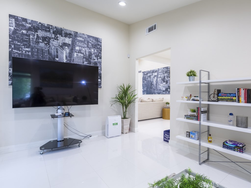 3305 Hawkwood Road Diamond Bar, CA 91765 - Photo 18 of 32 a living room with furniture and a flat screen tv