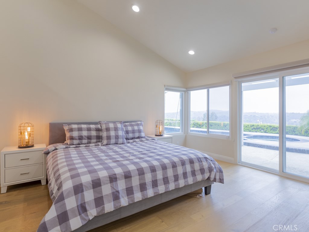 3305 Hawkwood Road Diamond Bar, CA 91765 - Photo 20 of 32 a bedroom with a large bed and a large window