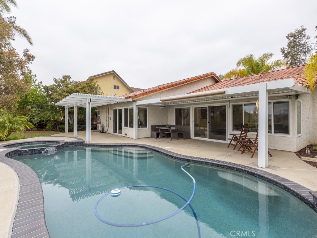 3305 Hawkwood Road Diamond Bar, CA 91765 - Photo 30 of 32 a view of a house with swimming pool and porch