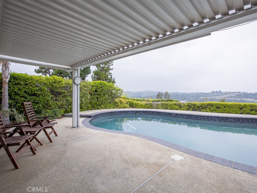 3305 Hawkwood Road Diamond Bar, CA 91765 - Photo 31 of 32 a view of swimming pool with outdoor seating and plants