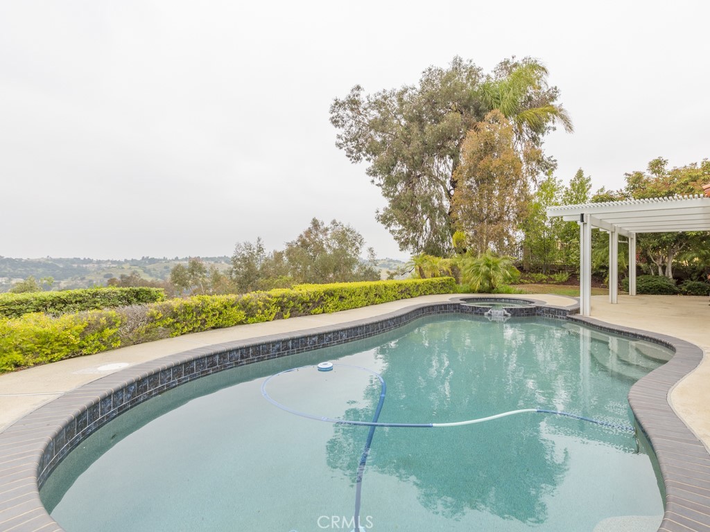 3305 Hawkwood Road Diamond Bar, CA 91765 - Photo 32 of 32 a view of a swimming pool with a balcony